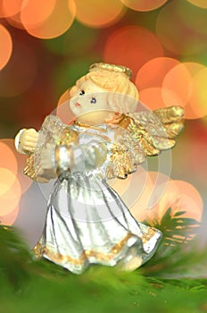 Christmas decoration, figure of little angel playing the harp