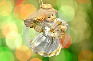 Christmas decoration, figure of little angel playing the harp
