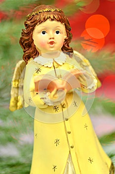 Christmas decoration, figure of little angel singing carols