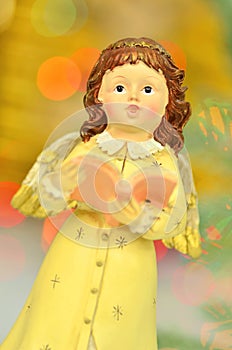 Christmas decoration, figure of little angel singing carols