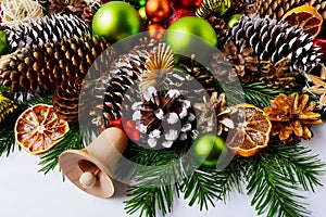 Christmas decoration with fir branches, pine cones and dried ora