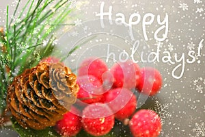 Christmas decoration, fir cone and branch, red berries, the text of a good weekend