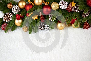 Christmas decoration on fir tree branch closeup, gifts, xmas ball, cone and other object on white blank space fur, holiday concept