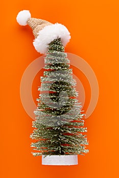 Christmas decoration, fir tree on orange background