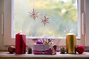 Christmas decoration in front of a window