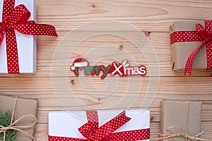 Christmas decoration, gift box and pine tree branches on wooden background, preparation for holiday concept, Happy New Year and Xm