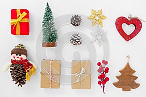 Christmas decoration with gift boxes and ornament on white background. photo