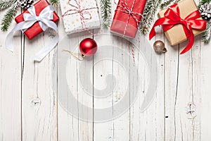Christmas decoration and gift boxes on wooden background