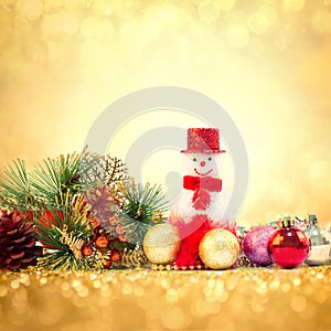 Christmas decoration and the gifts on sweet gold glitter light