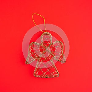 Christmas Decoration, golden wire braided angel. Christmas minimalistic composition concept