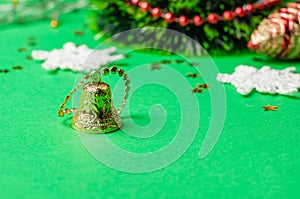 Christmas decoration on the green background. Ornaments, snowflakes, stars. Christmas tree