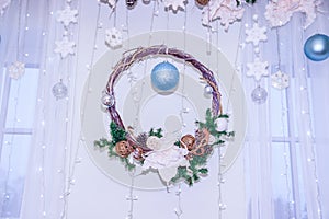 Christmas decoration of the hall in the restaurant. Holiday in the restaurant. New Year`s decor. White scenery. The interior.