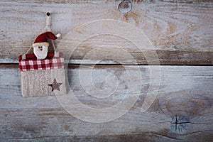 Christmas decoration (handmade toy) over wooden background