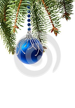 Christmas decoration. Hanging blue ball on christmas tree on a white background with space for text