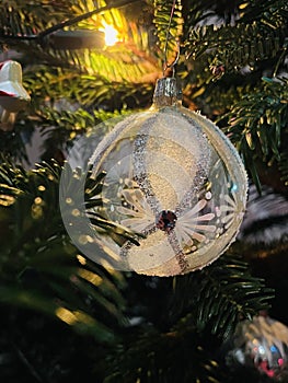 Christmas decoration hanging on Christmas tree