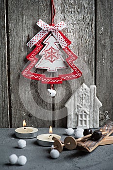 Christmas decoration hanging over wooden background
