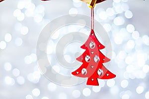 Christmas decoration hanging over wooden blue background, christmas card