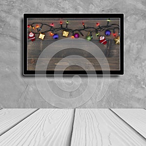 Christmas decoration with hdtv on concrete wall background