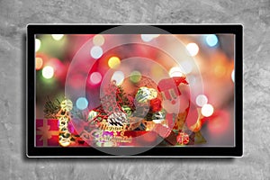 Christmas decoration with hdtv on concrete wall background