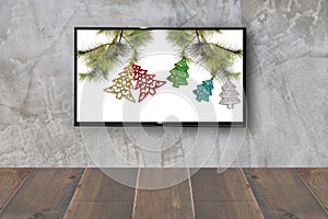 Christmas decoration with hdtv on concrete wall background