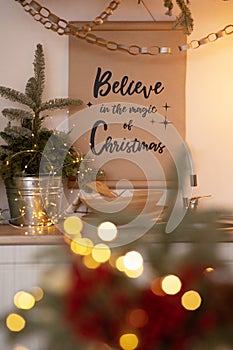 Christmas decoration and inscription on the kitchen wall