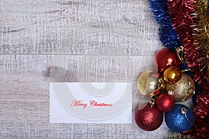 Christmas decoration isolated white. Red and golden gift boxes with three ball, floral ornament. Top view. Square composition.