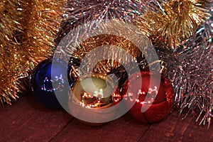 Christmas decoration isolated white. Red and golden gift boxes with three ball, floral ornament. Top view. Square composition.