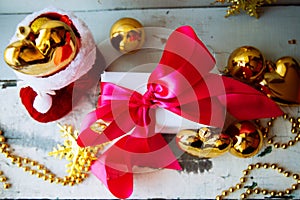 Christmas decoration isolated white. Red and golden gift boxes with three golden ball, and floral ornament. Top view. Square compo