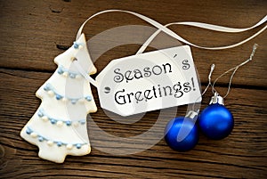 Christmas Decoration with Label with Seasons Greetings on it photo