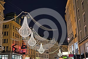 Christmas decoration and lights in Graben shopping street by night in Vienna