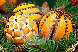 Christmas decoration with oranges and fir tree