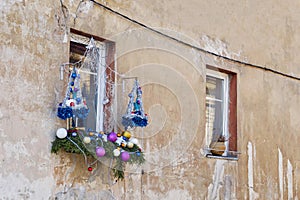 Christmas decoration outside window on a house