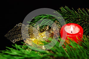 Christmas decoration: pine branch, candle, balls