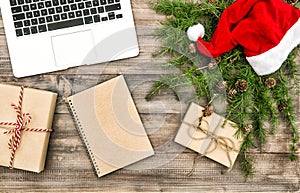 Christmas decoration pine branches gifts flat lay