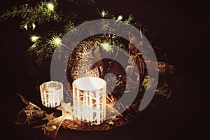 Christmas decoration with pine branches, reindeer and candleligh