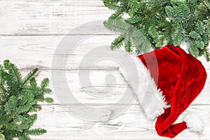 Christmas decoration pine tree branches wooden background