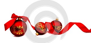 Christmas decoration red balls with ribbon isolated