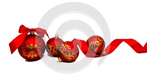 Christmas decoration red balls with ribbon isolated on a white