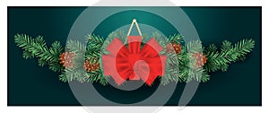 Christmas Decoration with Red Bow on Fir Tree Branches with Cones. Green Background