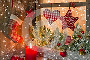 Christmas decoration with red candle and hearts