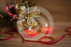 Christmas decoration with red candles burning