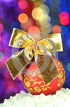 Christmas decoration, red Christmas ball with golden bow