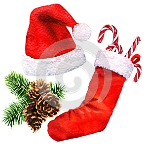 Christmas decoration, red Santa Claus hat, christmas stocking with candy canes and pine branch with three brown cones