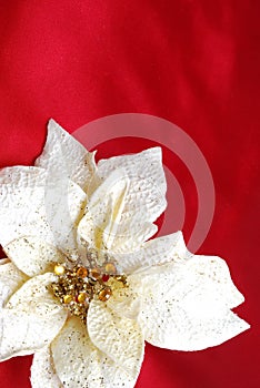 Christmas decoration on red sateen