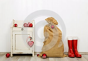 Christmas decoration in red and white colors with sack, presents