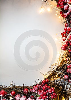 Christmas decoration on the right side of white background with lights