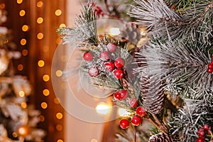 Christmas decoration with rowan berries. garland lights