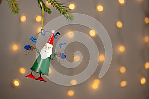 Christmas decoration. Santa Claus, Papa Noel hanging on needles