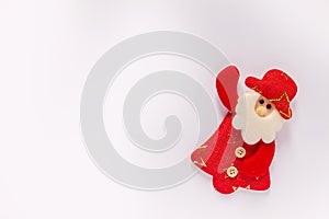 Christmas decoration with Santa Claus toy in white background