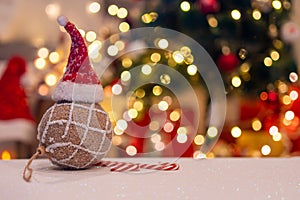 Christmas decoration with Santa hat and toy. Winter season holiday with light bokeh